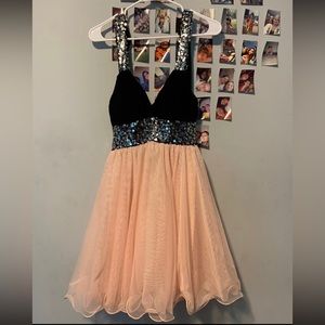 I am selling a above the knee dress, I wore for my semi formal and that’s all